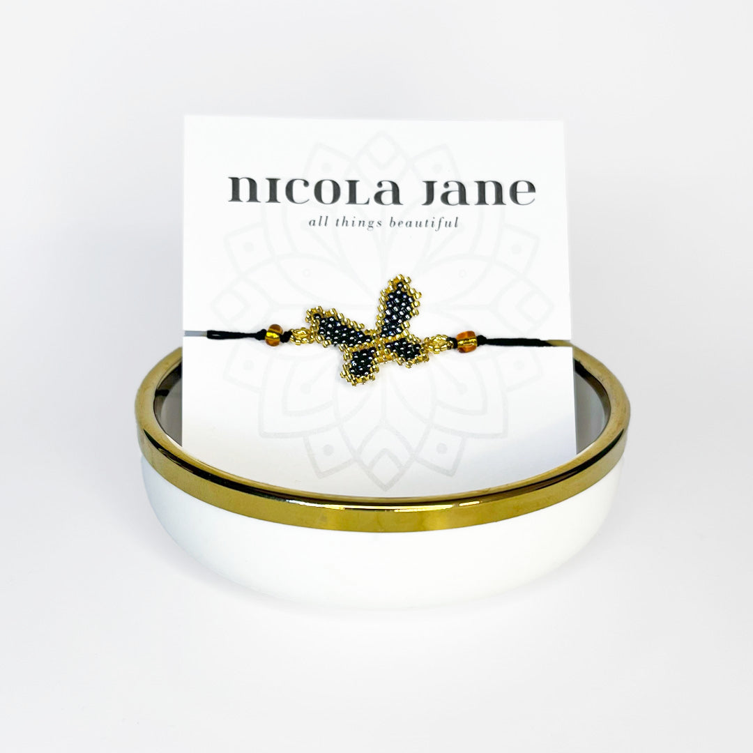Beaded bracelet - grey butterfly