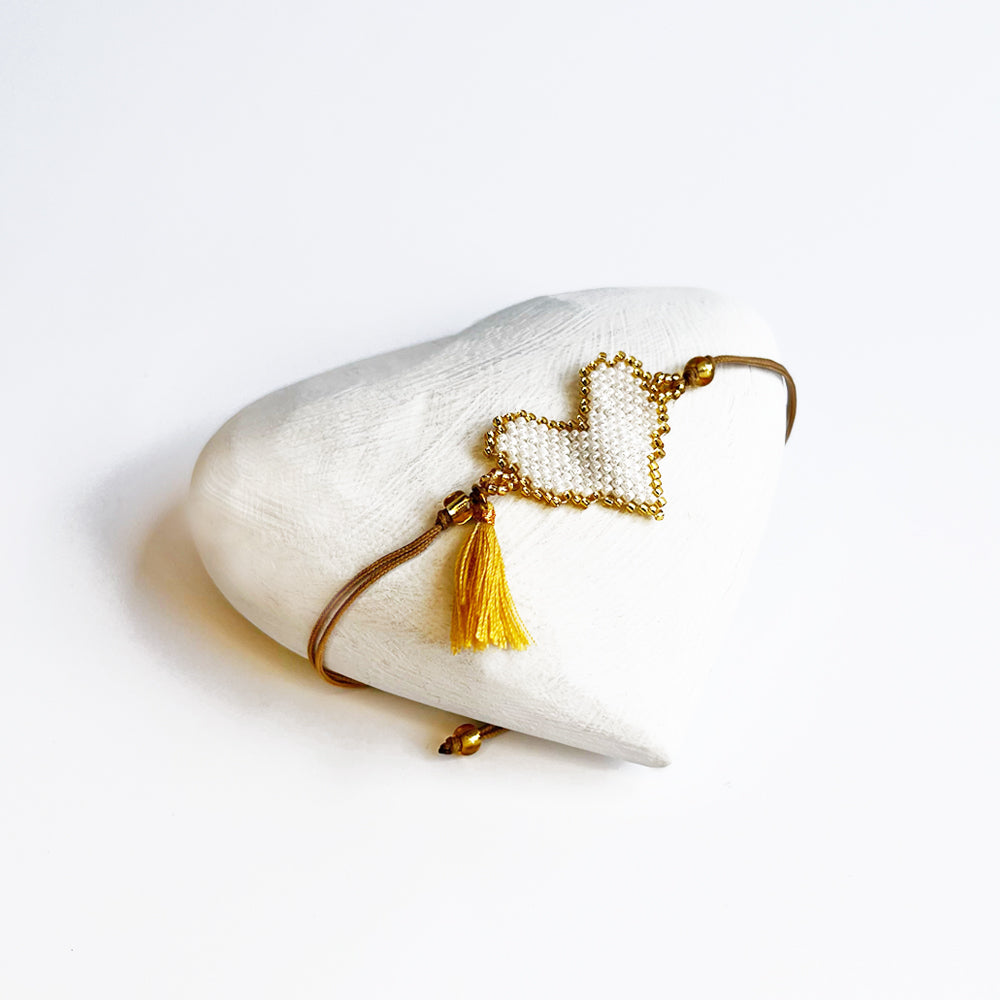 White heart with gold outline