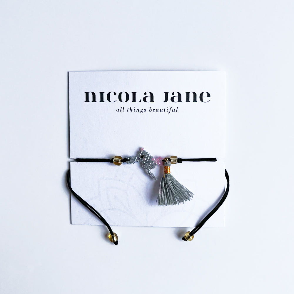 Small grey mouse with tassel