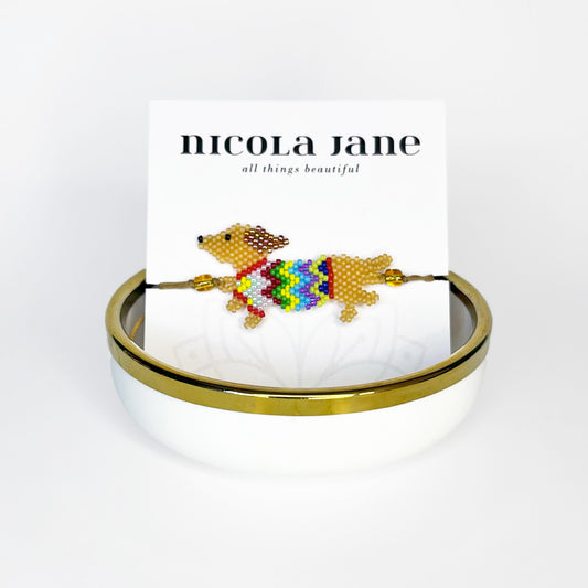 Beaded bracelet - dachshund with zig-zag jacket